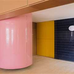 A Pink Stair Punctuates a Family’s Renovated 720-Square-Foot Madrid Apartment