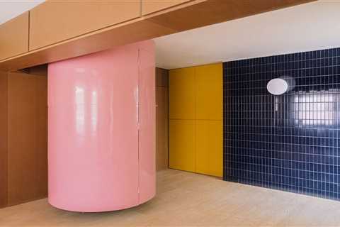 A Pink Stair Punctuates a Family’s Renovated 720-Square-Foot Madrid Apartment